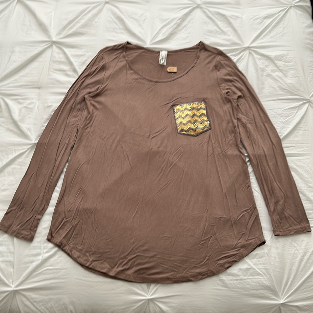 Light brown, long sleeve T-shirt with gold and dark brown sequins pocket. Size L